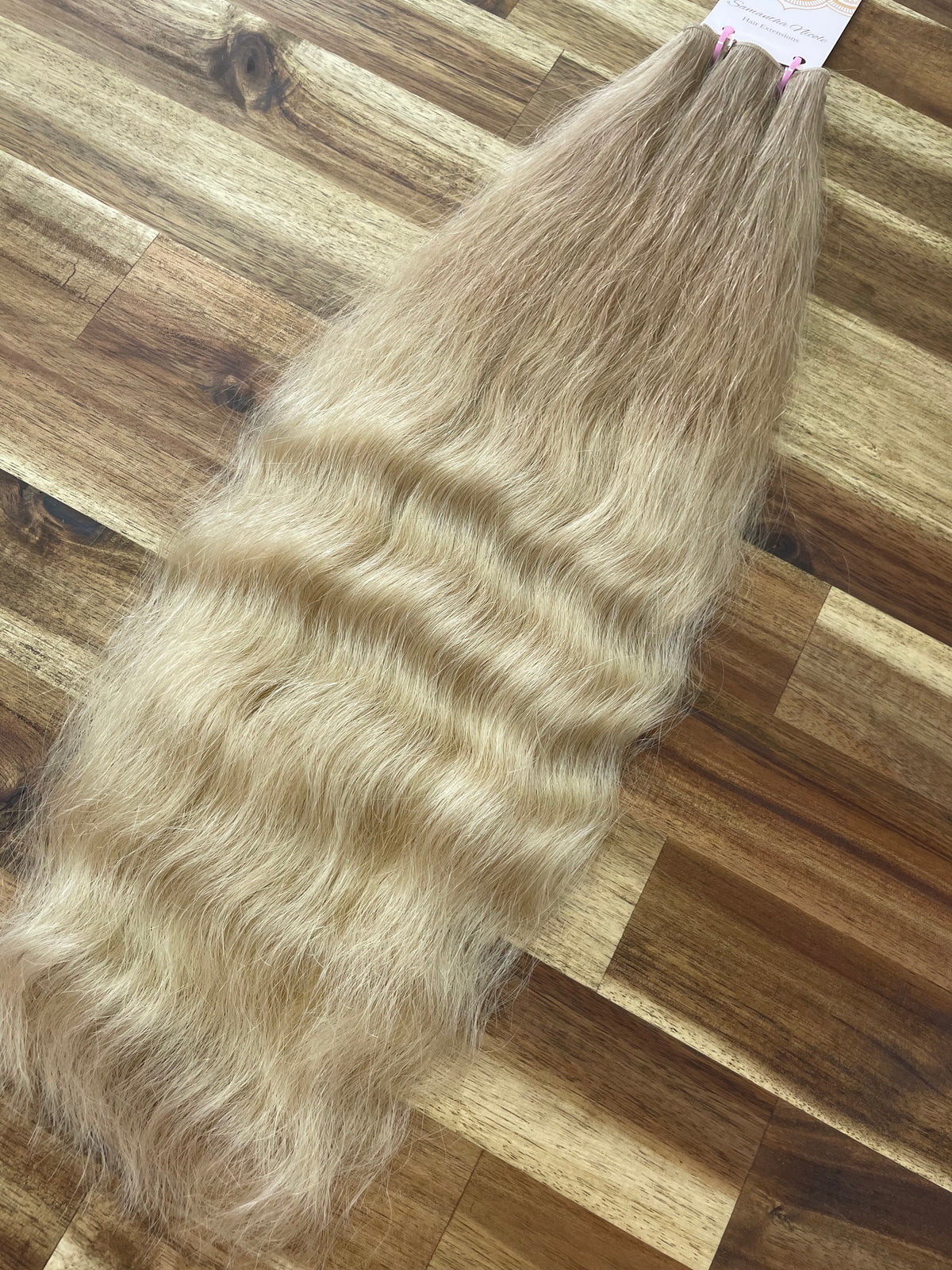 Carly 20"|84 grams Invisible Weft